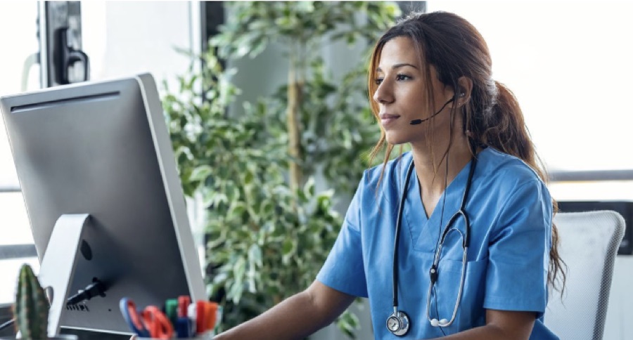 A clinician on a headset conducting a virtual visit
